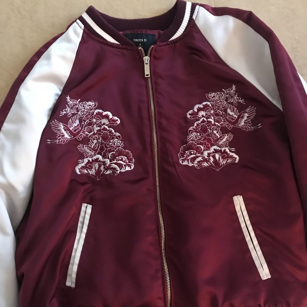 maroon and gold Bomber jacket